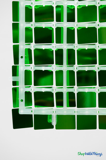 Back side of Emerald Green Shimmer Sequin Wall Panel showing durable clear snap-together plastic grid backing and mounting holes – ShopWildThings modular shimmer wall panel