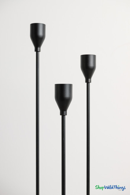 Minimalist matte black long stem candle holder set of three with round bases and sleek taper cups for modern event decor