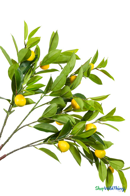 Close up of artificial lemon interchangeable branch showing realistic small lemons and layered green citrus leaves – ShopWildThings decor