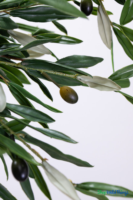 Close-up of artificial olive fruit and leaves on premium 9.5 ft tall faux olive tree from ShopWildThings