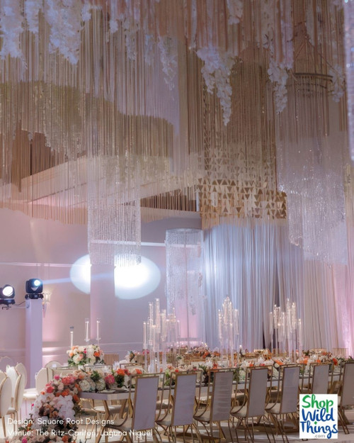Create dazzling ceiling installation by layering Beaded, Metallic, and String Fringe Curtains by ShopWildThings.com
Need a custom color? Length? Our in-house fabrication team can make that happen!
Luxurious Wedding Reception – Grand Ceiling Decor Installation
