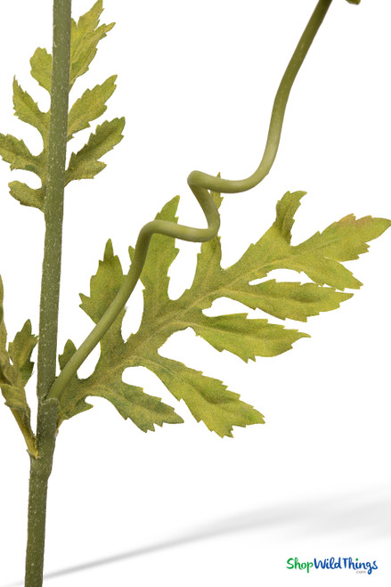 Detailed view of artificial poppy stem with textured green leaves and bendable wired stem for natural shaping