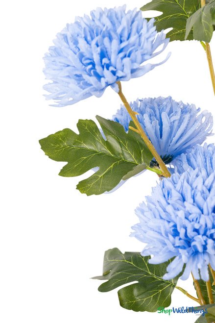 Blue Faux Chrysanthemum Bouquet – 27" Faux Floral Stem (8 Heads) close-up showing soft blue petals, realistic green leaves, and detailed faux stem texture, ShopWildThings.com