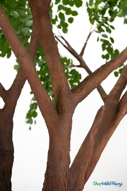 Sylvie 12ft Premium Faux Eucalyptus Tree styled as a grand focal point inside an elegant wedding venue – ShopWildThings.com