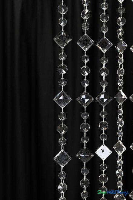 Clear acrylic crystal beaded curtain strands hanging vertically with faceted square and octagon beads, professional decorative curtain for weddings and stage design