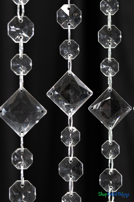 High grade acrylic crystal beaded curtain close-up featuring 1 inch faceted square beads, 1/2 inch octagon beads, and metal jump ring connections for event backdrops