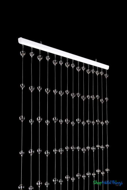 Clear Round Spheres Acrylic Ball Beaded Curtain 3' x 6' with 15 clear acrylic sphere strands hanging from white header rod – ShopWildThings.com