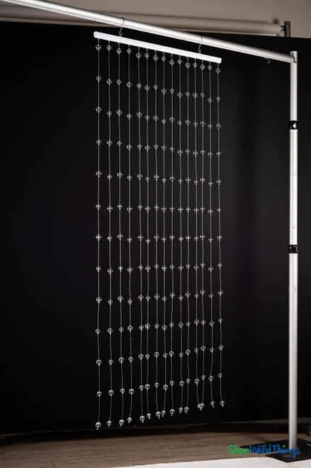 Clear Round Spheres Acrylic Ball Beaded Curtain 3' x 6' with 15 clear acrylic sphere strands hanging from white header rod – ShopWildThings.com