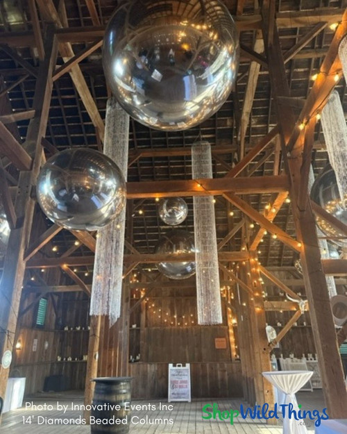 Nothing adds high impact glam quicker then Diamonds Crystal Beaded Iridescent Columns by ShopWildThings.com! We stock dazzling round and square columns up to 20' lengths. Beaded Columns are great for easy ceiling decor at parties and weddings, but they can also be ground supported with our Column Riser Kits!