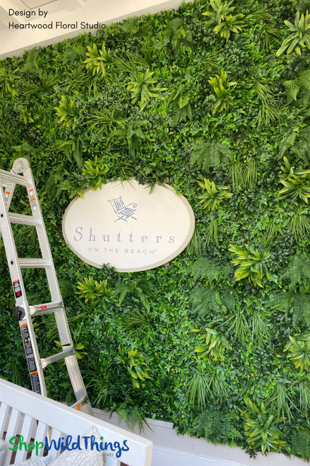 Create a refreshing outdoor space with a gorgeous statement wall made with ShopWildThings “Paradise” Indoor/Outdoor UV Artificial Greenery Wall Panel.