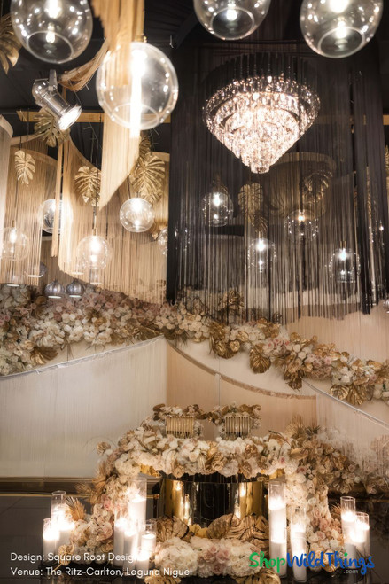 String Curtains are super popular with designers in 2024! Completely customizable to any color or length you need and can also be created as matching String Columns and Chandeliers, plus it’s possible to get them Fire Rated as well. The team at ShopWildThings.com has many styles in stock and ready to ship from Arizona but can also fabricate incredible designs just for you!

Gold, Champagne, Black
2024 Wedding Decor Trends – ShopWildThings.com – Since 1989

Custom String Fringe Curtain Ceiling Installation – Glam Wedding Ideas