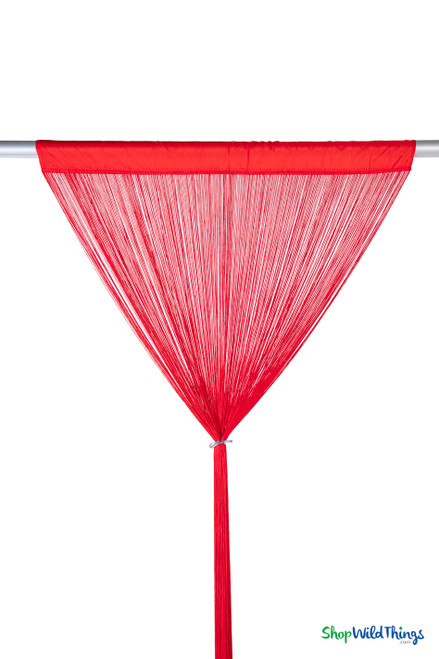 ShopWildThings 12-Foot Red Fire-Rated String Curtain tied in the center for decorative draping display, showing long soft fringe strands gathered at the middle.