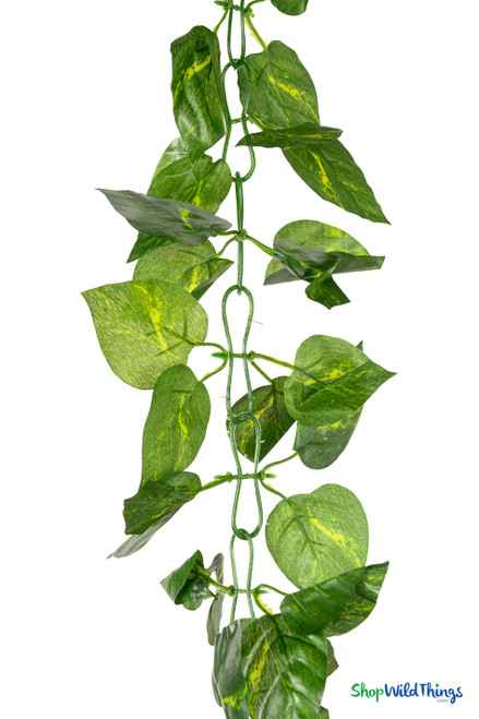 Hanging silk Pothos vine garland 8 feet long with lifelike green leaves and durable chain link connections, premium greenery décor from ShopWildThings.