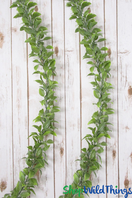 Leafy green table runner | Hanging garland for wedding arch or mantle | Faux  osmanthus leaf vine | ShopWildThings.com