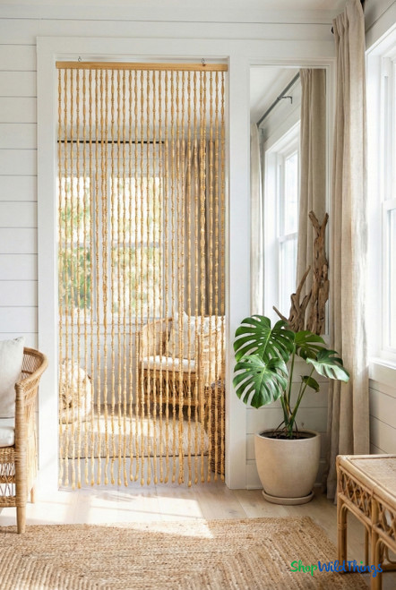 Bohemian beach house doorway with Sunnyvale Natural wood beaded curtain room divider from ShopWildThings.com
