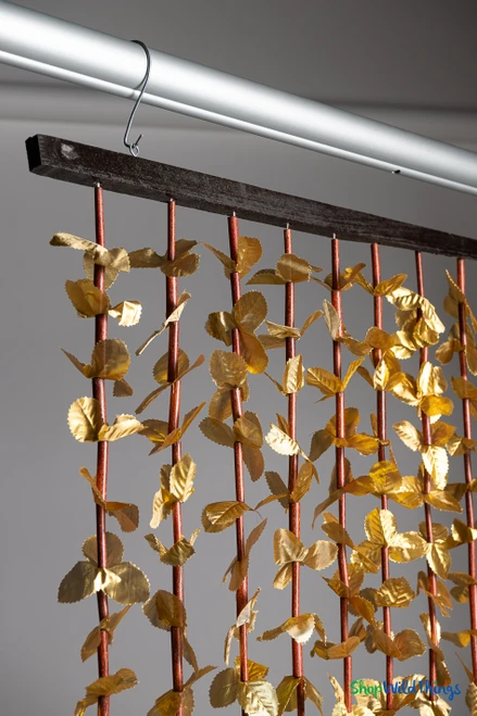 Metallic Gold FabuLush Hanging Silk Floral Curtain with gold fabric leaves and natural bamboo accents, 35 inches wide by 5.5 feet long, ShopWildThings.com.