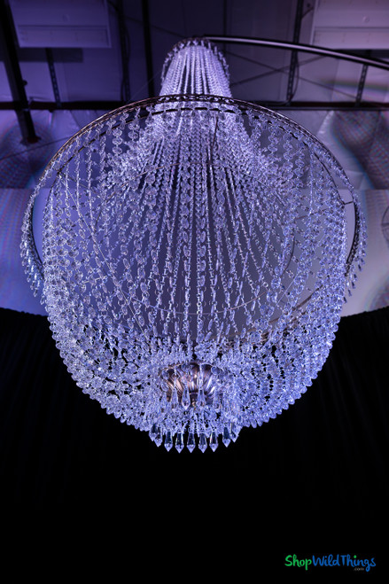 Underside perspective of Tillie XL acrylic beaded chandelier showing circular frame structure, layered bead strands, and bottom pendant cluster for dramatic event lighting.