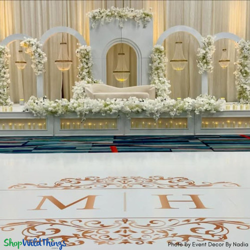 Gorgeous Wedding Reception Stage Decor with Chandeliers
"Tillie" Empire Swag Chandeliers to create this jaw-dropping wedding backdrop. Crafted with premium acrylic crystals, these chandeliers add glamour and sophistication to any space. Available at ShopWildThings.com

Want even more options? Explore our "Millie" collection for real crystals or the "Savoy" collection for elegant white pearls. Each collection offers three sizes to fit your design needs.