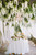 Use Draping Flower Garlands and Greenery Vines To Create Affordable, Hanging Floral Chandeliers by ShopWildThings.com