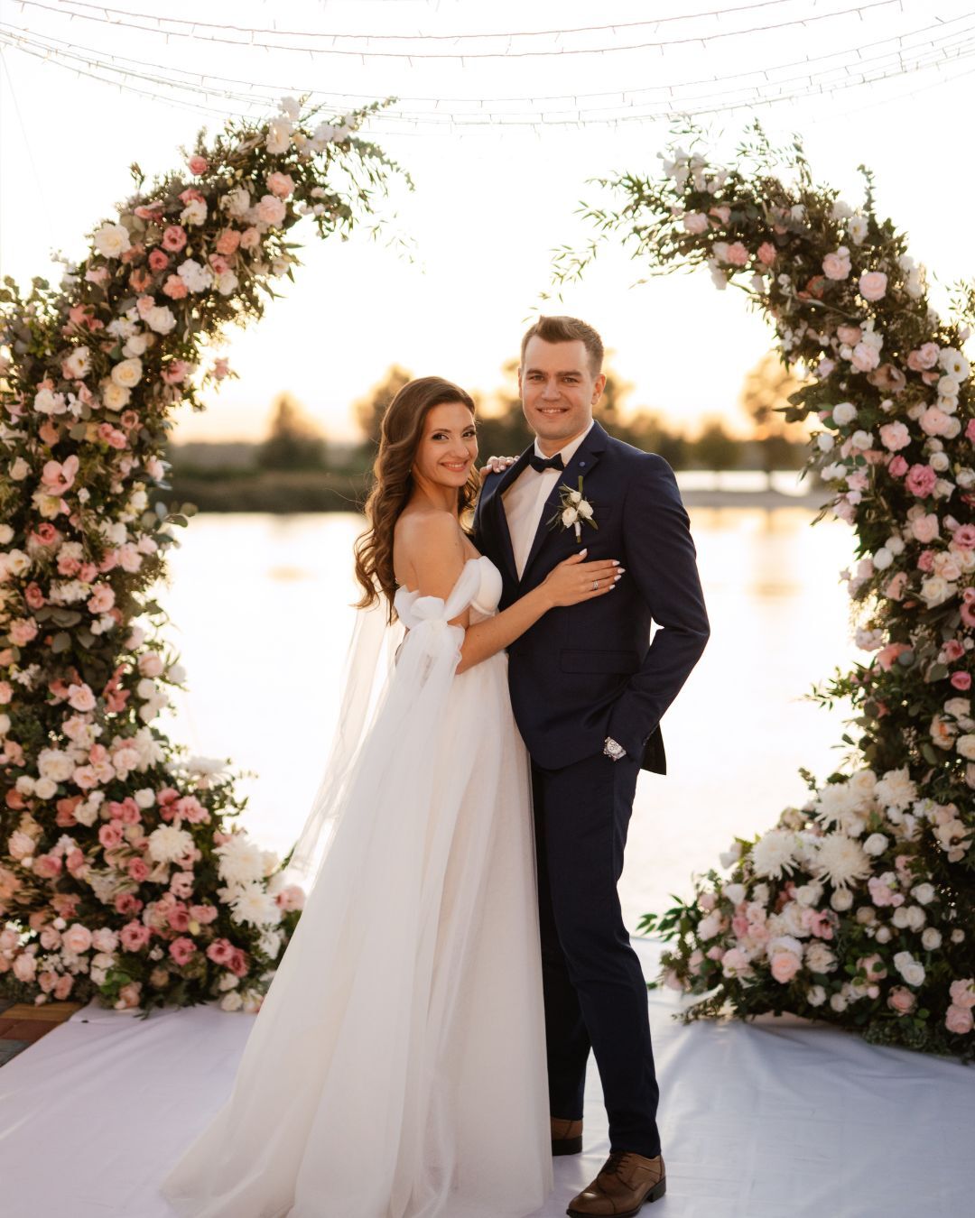 Create a Dreamy Lakeside Wedding with Half Moon Arches, Artificial Silk Florals, Greenery, and Garlands with ShopWildThings.com
