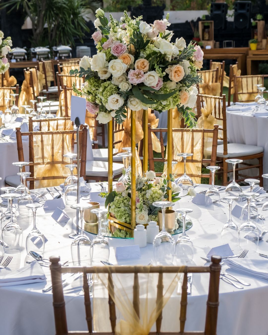 Outdoor Summer Centerpiece with Gold Floral Risers and Beautiful Roses by ShopWildThings.com