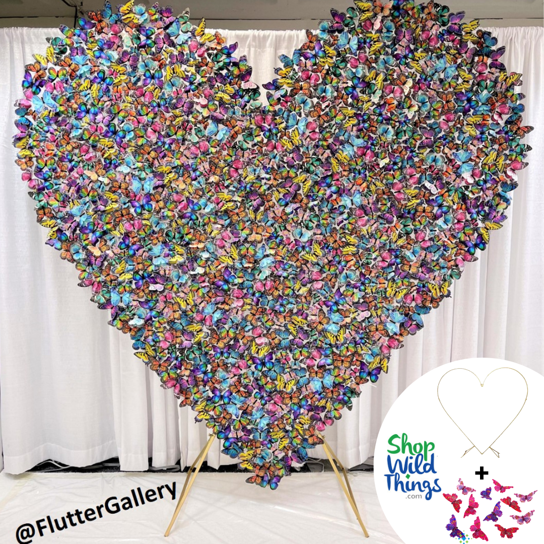 Our Metal Heart Arch is covered in gorgeous butterflies for a unique twist on Valentine's Day Decor