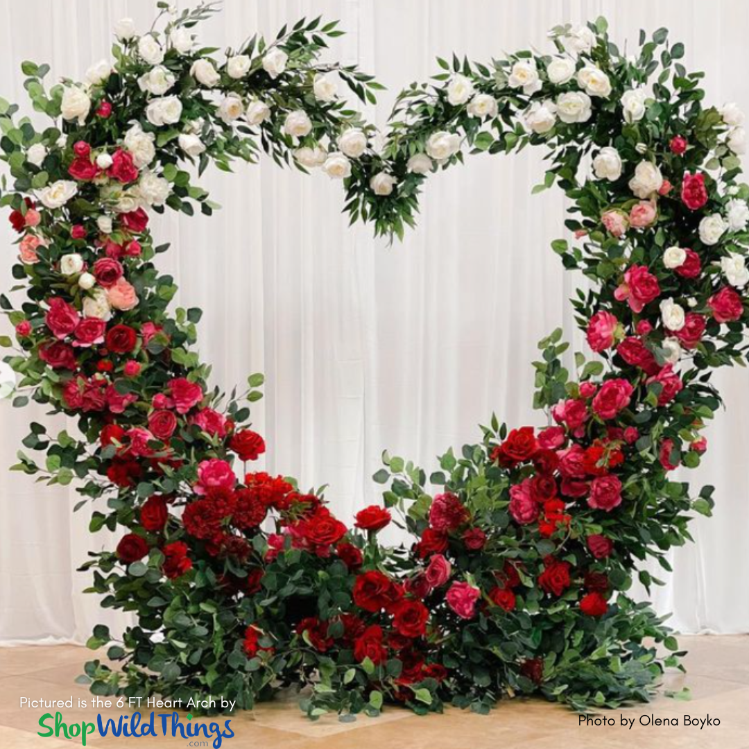 Beautiful 6 FT Heart Shaped Arch by ShopWildThings decorated for a Valentine's Day in lots of fresh florals. 