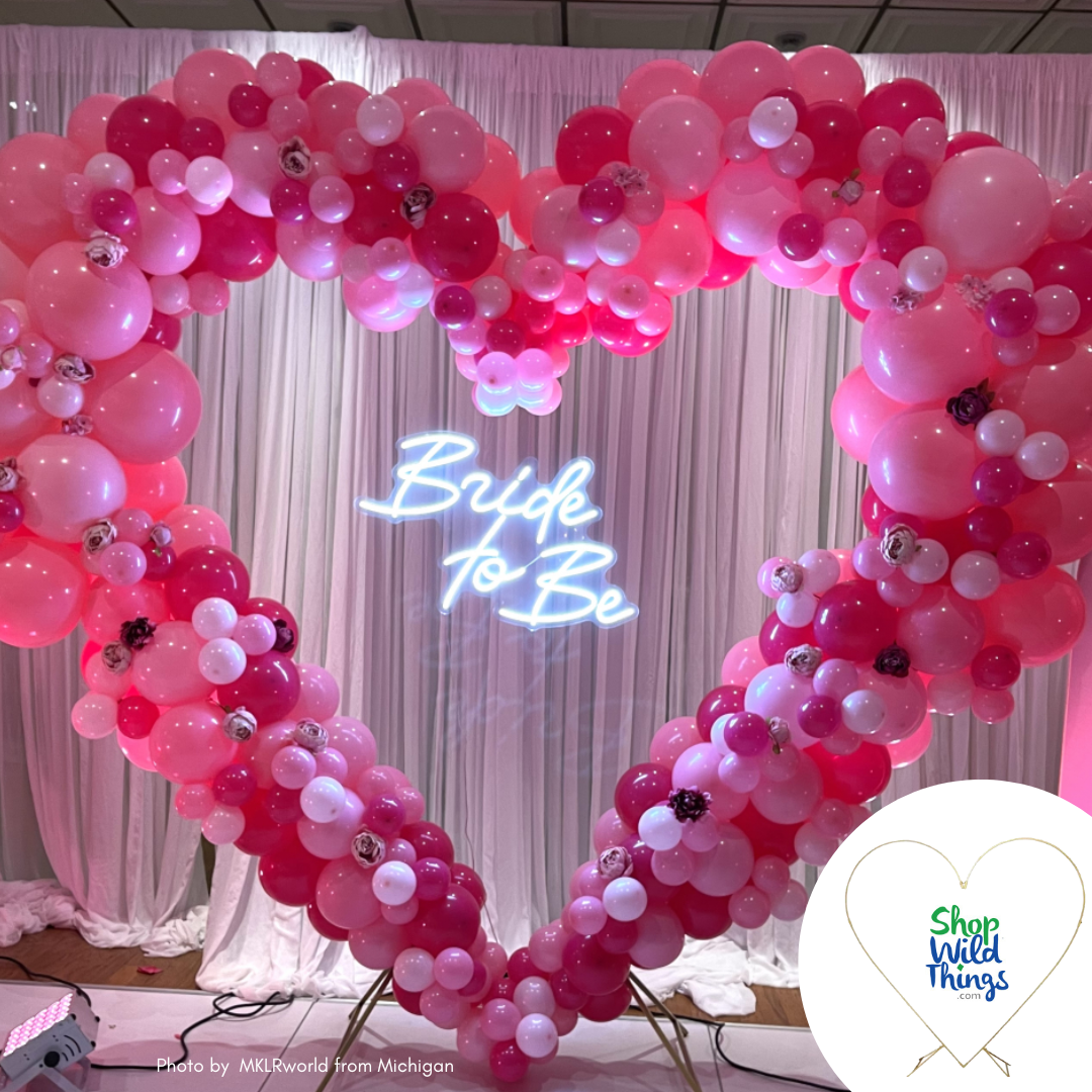 Heart Shaped Metal Arch by ShopWildThings decorated for a Bridal Shower