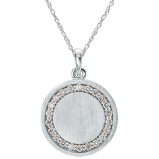 Round diamond halo disc initial pendant in sterling silver.