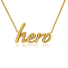 Hero name necklace lowercase letters in 14k yellow gold.