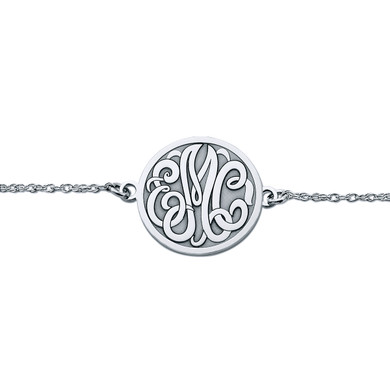Monogram solid round disc bracelet with script initial letter details in sterling silver.