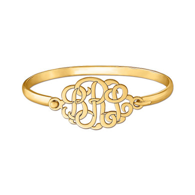 Bangle bracelet with three script letter monogram in 14k yellow gold.