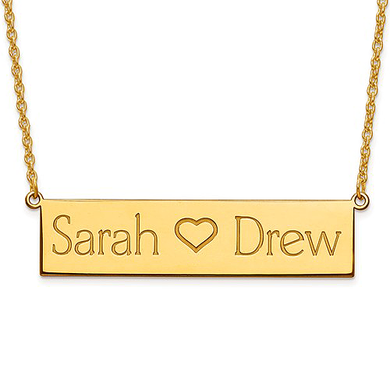 Polished names heart bar plate necklace in 14K yellow gold.