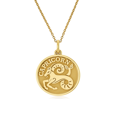 Capricorn Zodiac Sign Disc Pendant in 14k yellow gold with chain.