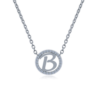 Diamond halo capital letter circle necklace in 14k white gold.