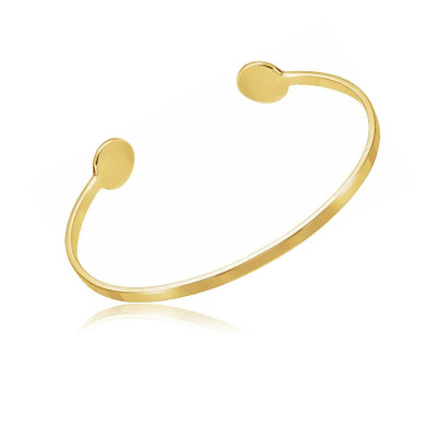 Engravable initial cuff bangle bracelet in 14k yellow gold.