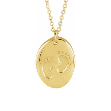 Monogram tiny footprint oval disc pendant in 14k yellow gold.