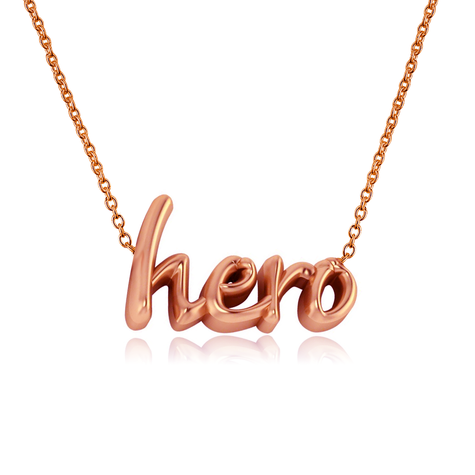 Hero name necklace lowercase letters in 14k rose gold.