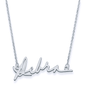 Signature cursive name plate necklace in 14K white gold.