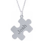 Personalized puzzle piece name pendant in sterling silver.
