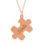 Personalized puzzle piece name pendant in 14k rose gold.