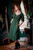Persephone Summer Dress, Green, front view with hands in pockets