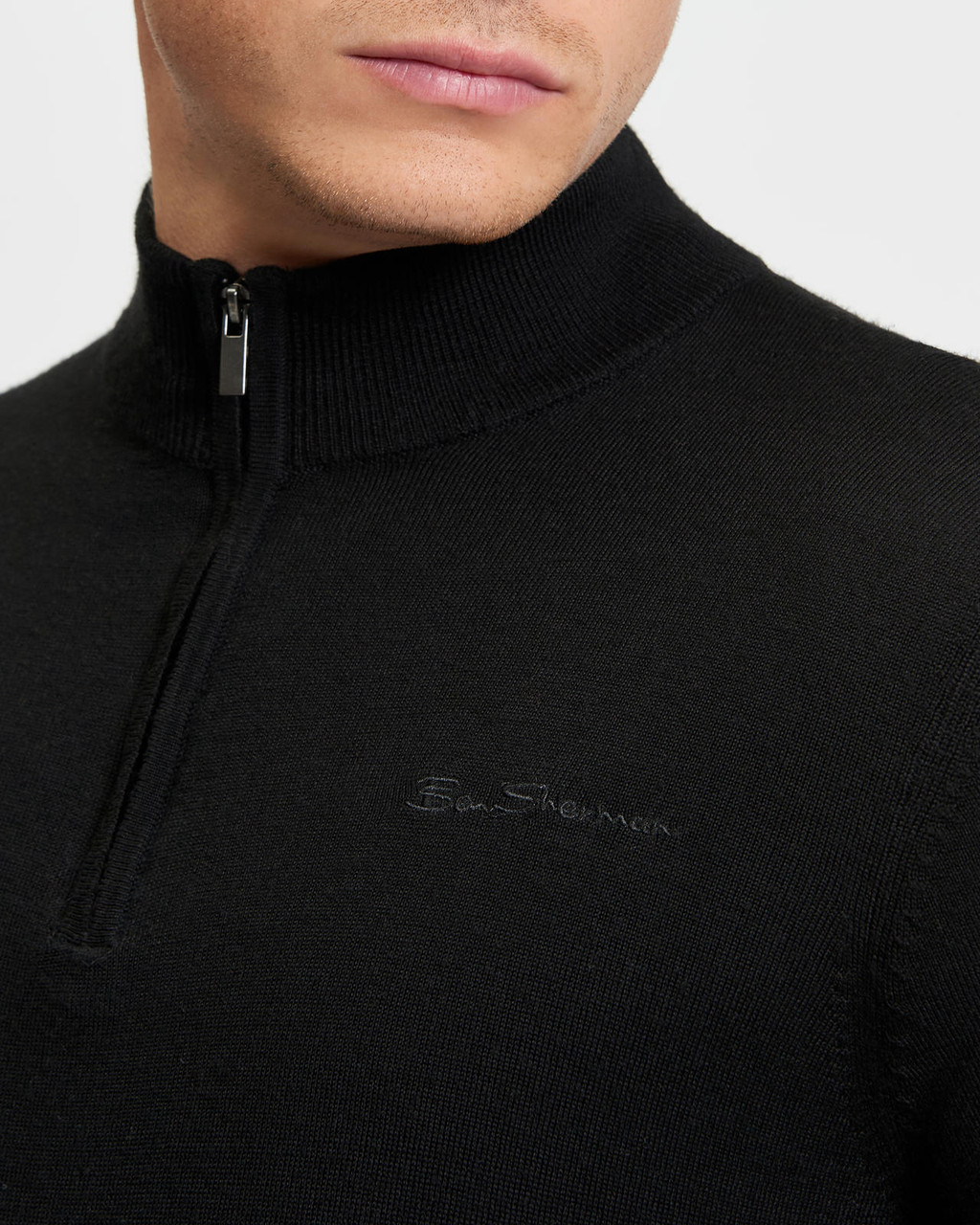 MERINO HALF ZIP in Black