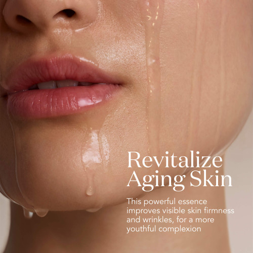 SK-II LXP Ultimate Revival Essence anti-aging: close-up face with essence dripping; revitalize aging skin, improves elasticity and wrinkles for a youthful complexion - SK-II US