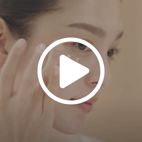 SK-II LXP Ultimate Revival Eye Cream application video thumbnail, close-up showing how to apply under-eye treatment; SK-II US eye care