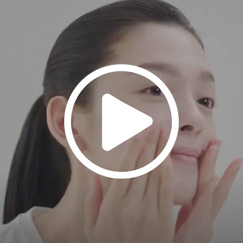 SK-II Skinpower Essence for youthful, firm skin, model applying anti-aging essence to face, skincare video thumbnail - SK-II US