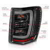 ANZO 1999-2004 Jeep Grand Cherokee LED Tail Lights w/ Light Bar Black Housing Clear Lens - 311394 Photo - Unmounted