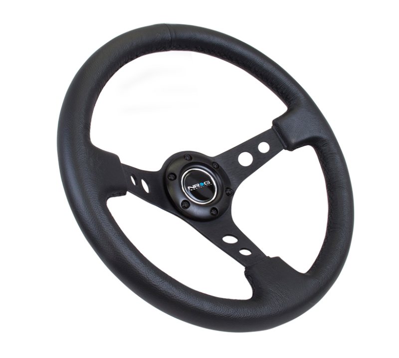 NRG Reinforced Steering Wheel (350mm / 3in. Deep) Blk Leather w/Blk Spoke & Circle Cutouts - RST-006BK