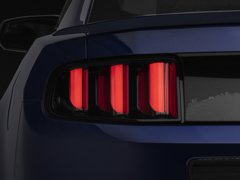 Raxiom 13-14 Ford Mustang Vector V2 Tail Lights- Black Housing (Clear Lens) - 408606