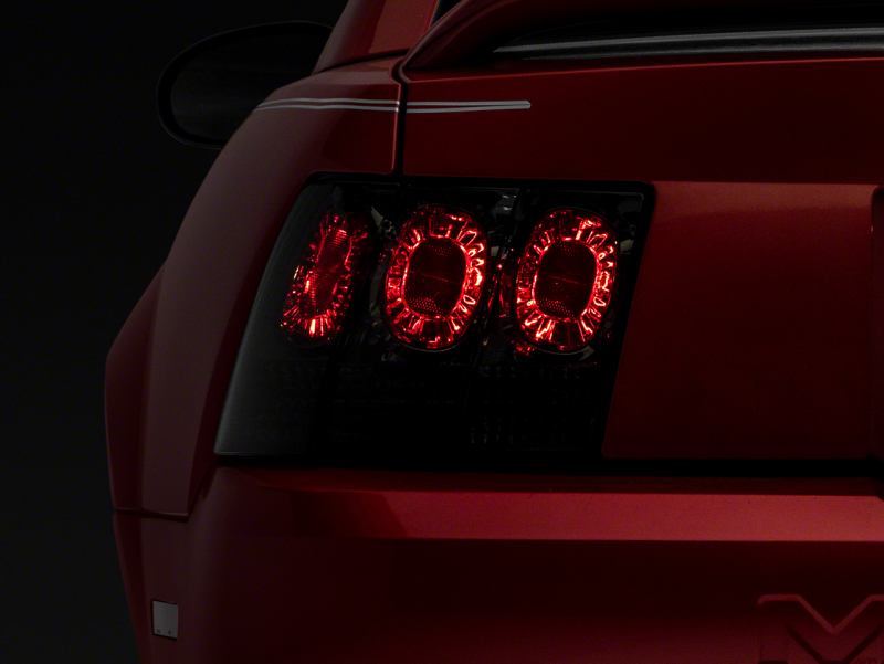 Raxiom 99-04 Ford Mustang Axial Series Altezza Style Tail Lights- Blk Housing (Smoked Lens) - 413422